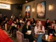 Excited moviegoers at a premiere night showcasing movie 4u latest releases in a vibrant theater.