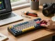 MCHOSE Ace 68 keyboard assembly in a creative workspace with colorful keycaps and switches.